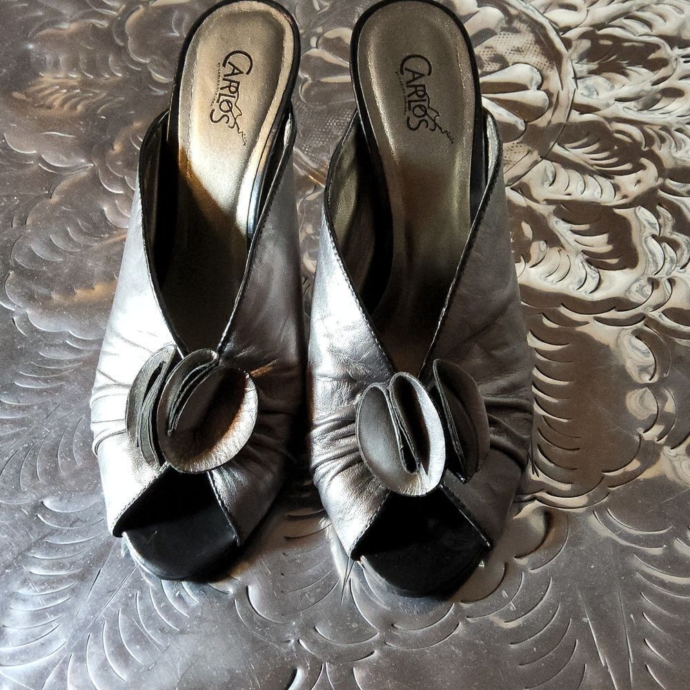 Carlos Santana 4"high heel mules, pewter silver in color,and black,leather upper